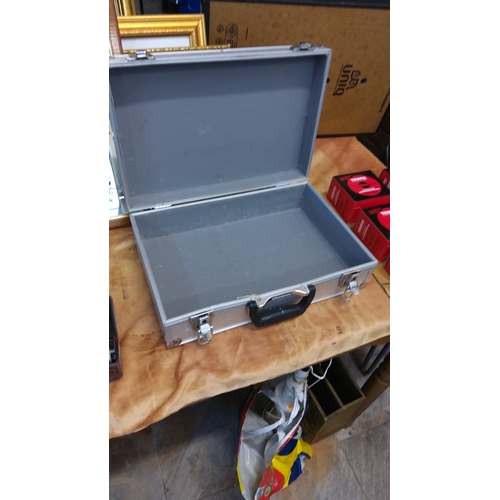 80 - Aluminium briefcase-style carry case with ribbed panels, twin clasp locks, metal corners and moulded... 