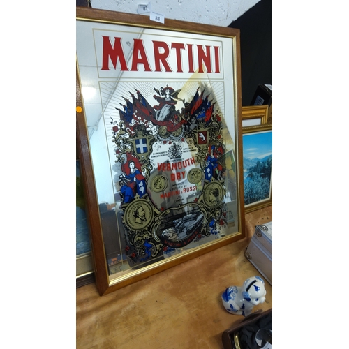83 - Framed glass advertising mirror for Martini & Rossi ‘Vermouth Dry’, reverse-printed with heraldic mo... 
