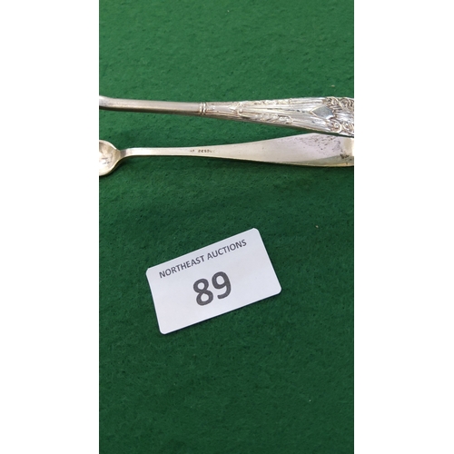 89 - Early 20th-century silver-plated sugar tongs with chased foliate terminals