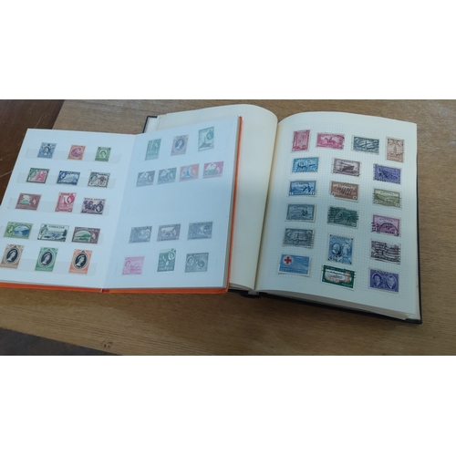 39 - Collection of two albums housing assorted mid-20th-century postage stamps, chiefly British Empire is... 