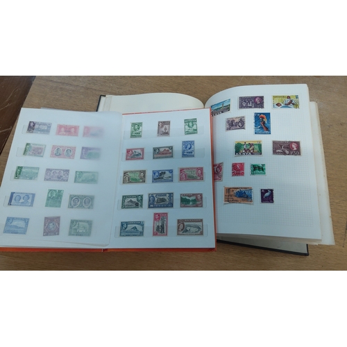 39 - Collection of two albums housing assorted mid-20th-century postage stamps, chiefly British Empire is... 