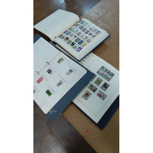 42 - Group of 3 large  albums housing an assorted worldwide postage stamp collection, various countries a... 