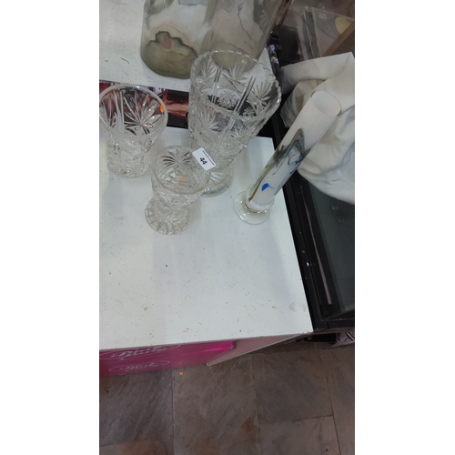 44 - Set of four assorted vases: three clear cut lead-crystal examples with hobstar and fan motifs, toget... 
