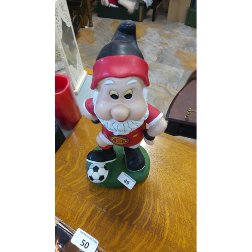 49 - Hand-painted resin garden gnome ornament in Manchester United football kit, standing with a soccer b... 