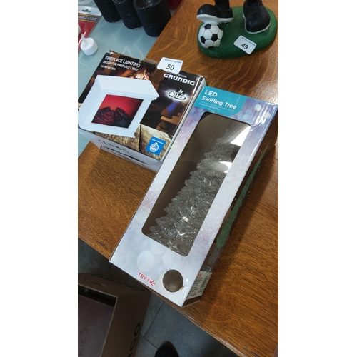 50 - Pair of boxed LED decorative lights comprising a Grundig “Fireplace Lighting” unit and a colour-chan... 