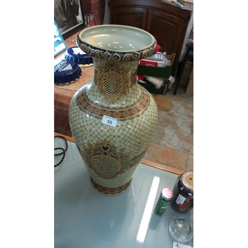 55 - Tall ceramic floor vase with pale celadon interior, gilt cobalt rim, and lattice-pattern body featur... 