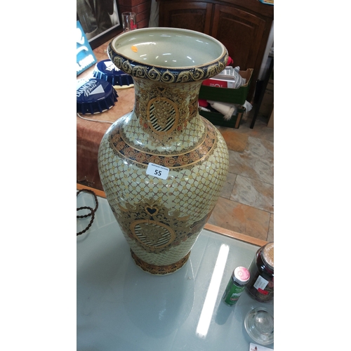 55 - Tall ceramic floor vase with pale celadon interior, gilt cobalt rim, and lattice-pattern body featur... 