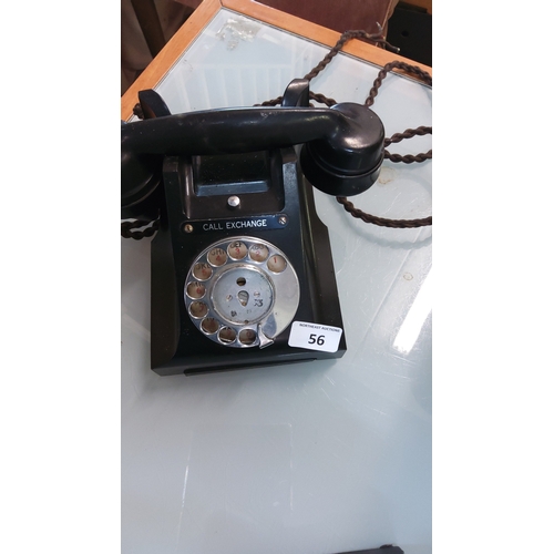 56 - Bakelite rotary dial telephone, model 232-style, with “CALL EXCHANGE” label, braided cloth handset c... 
