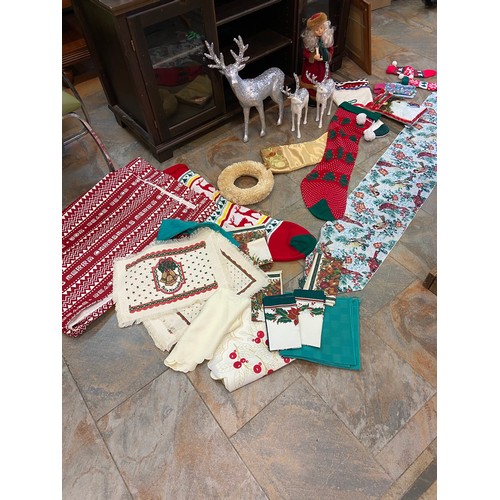 30B - Lot of xmas figures,stockings,napkins,table runner,large tablecloth etc..