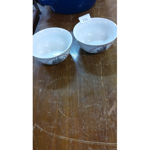 231 - Pair of white porcelain bowls printed with clipper ship illustration and red legend “It was built in... 
