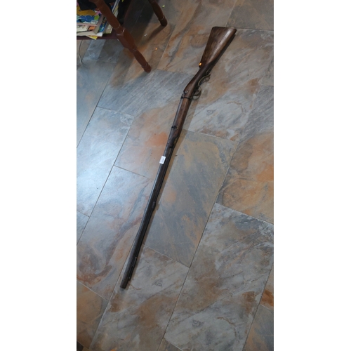 233 - Hardwood-stocked single-barrel percussion cap muzzle-loading shotgun with full-length steel barrel, ... 
