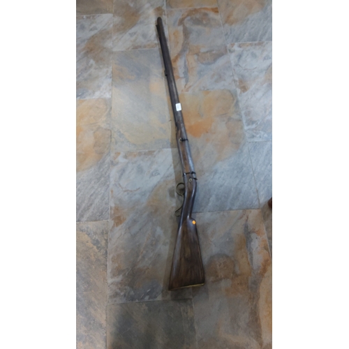 233 - Hardwood-stocked single-barrel percussion cap muzzle-loading shotgun with full-length steel barrel, ... 