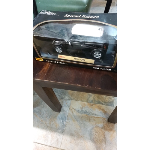 241 - Maisto Special Edition 1:18 scale die-cast model Mini Cooper, factory sealed in display box.