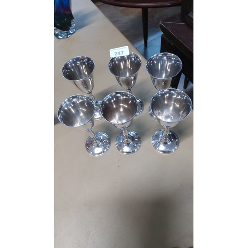 247 - Set of six English “Cavalier” silver-plated brass goblets, tapering bowls on turned stems and steppe... 