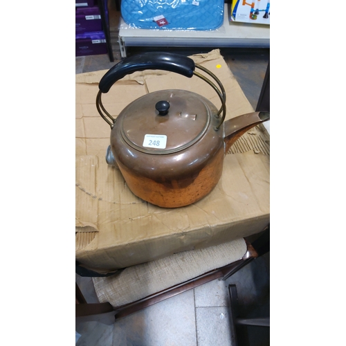 248 - Vintage solid copper kettle with arched brass handle fitted with black phenolic grip, domed lid with... 