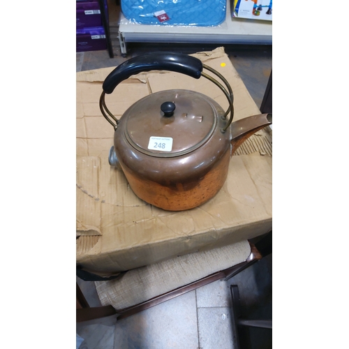 248 - Vintage solid copper kettle with arched brass handle fitted with black phenolic grip, domed lid with... 