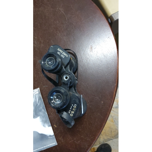 261 - Super Zenith 10×50 coated optical binoculars with neck strap.