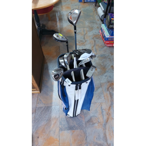 279 - Golf stand bag containing a mixed set of roughly ten right-handed irons, woods and putter, including... 