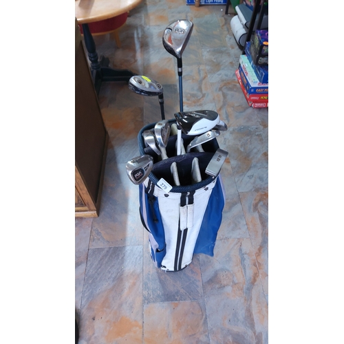 279 - Golf stand bag containing a mixed set of roughly ten right-handed irons, woods and putter, including... 