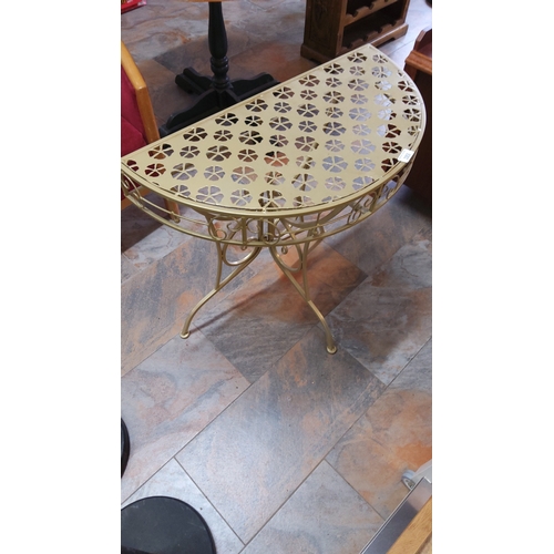 283 - Demi-lune pierced metal console table with clover cutwork top, scrollwork apron and three splayed le... 
