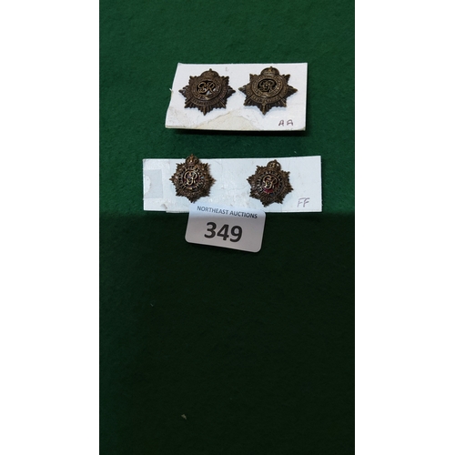 349 - Group of four British Royal Army Service Corps star-form collar badges, two bronzed OSD examples and... 