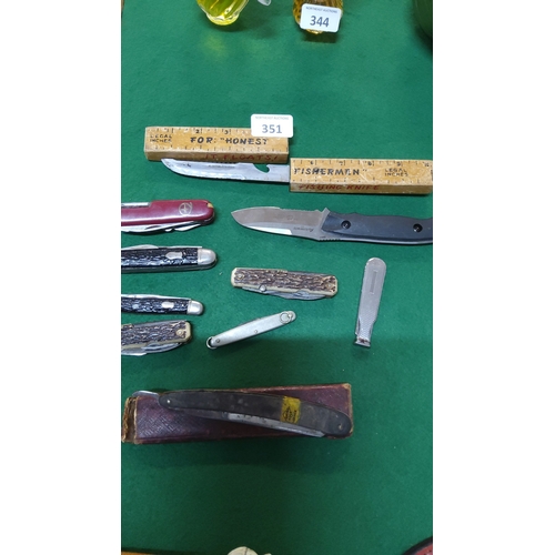 351 - Group of mixed pocket, folding and fixed-blade knives including Swiss-style multitool, ruler-handle ... 