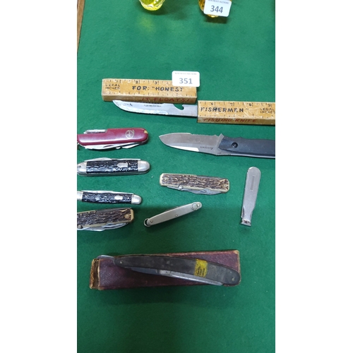 351 - Group of mixed pocket, folding and fixed-blade knives including Swiss-style multitool, ruler-handle ... 