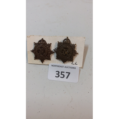 357 - Pair of bronzed metal eight-point garter star collar badges, each bearing George V cypher within “Ho... 