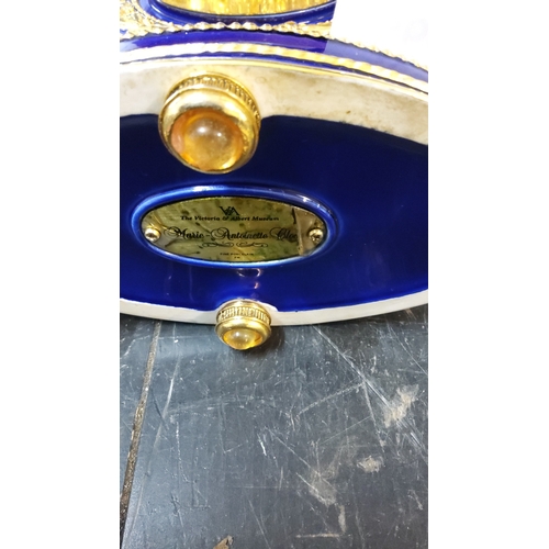 368 - Cobalt blue porcelain lyre mantel clock with gilt metal mounts, sunburst mask finial and Roman dial,... 