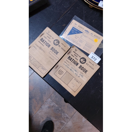 372 - Group of three British Ministry of Food ration and motor-fuel books, 1952–1954, printed paper bookle... 