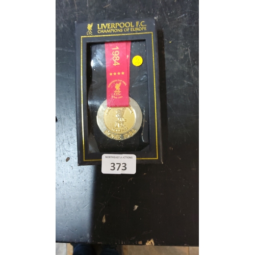 373 - Boxed Liverpool F.C. gilt-metal commemorative medal with red ribbon, inscribed “European Cup Final, ... 