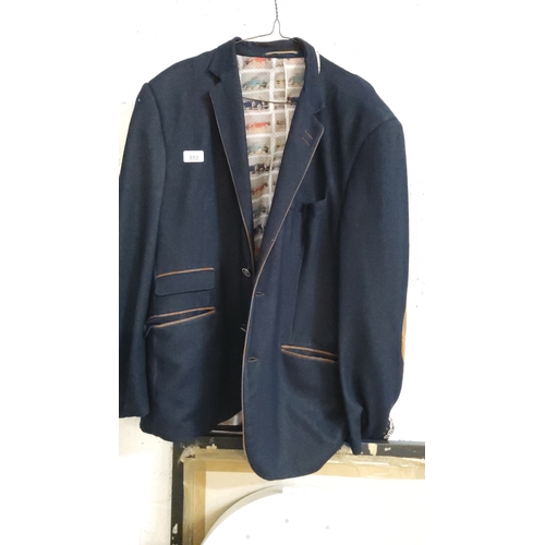 392 - Navy cotton blazer with contrast tan piped edges, flap pockets and vintage-car print polyester linin... 