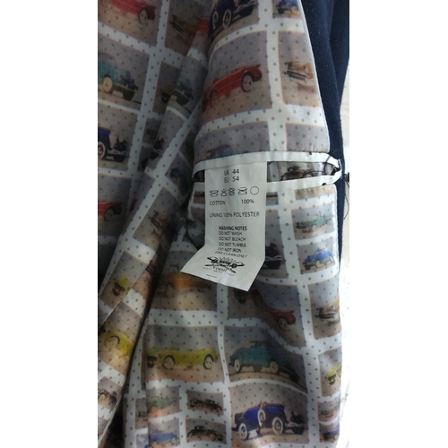 392 - Navy cotton blazer with contrast tan piped edges, flap pockets and vintage-car print polyester linin... 
