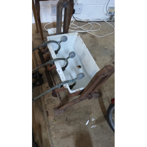 395 - Antique industrial porcelain sink with metal frame & specialised rods.(were common in factories & la... 