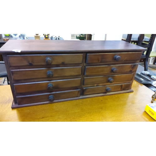 48 - Rectangular pine collectors tabletop chest with two banks of four small drawers, each fitted with tu... 