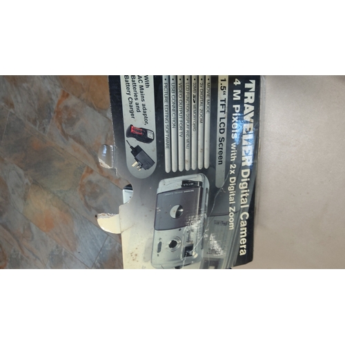 12 - Group of Traveler DC-4000 digital camera &  accessories, including original retail box, compact zip ... 
