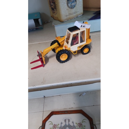 16 - A toy construction vehicle model, a Telescopic Loadall 520-4 articulated loader in yellow and white ... 