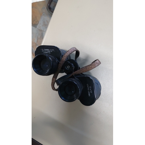 33 - A pair of J.H. Campbell & Co. Liverpool field binoculars, 10 x 50 with coated lenses, in black textu... 