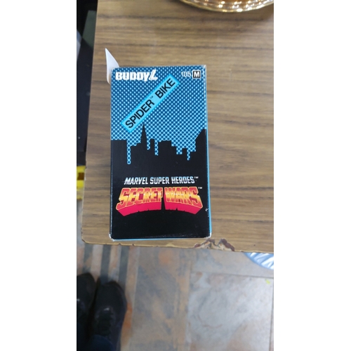 39 - A boxed Buddy L “Spider Bike” tinplate motorcycle toy, “Marvel Super Heroes Secret Wars”, with Spide... 