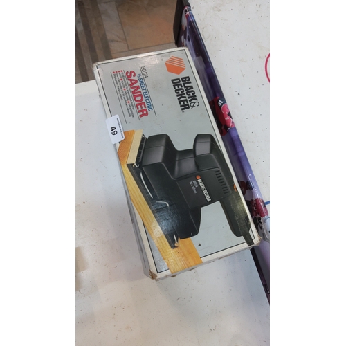 49 - A boxed Black & Decker 1/3 sheet electric sander, model BD12A, 90 x 181mm, in original card packagin... 