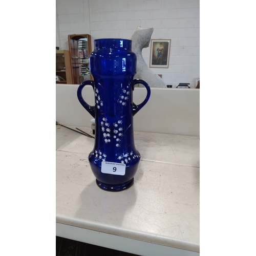 9 - Single cobalt-blue glass vase of baluster form with flared rim, applied loop handles, and trailing w... 