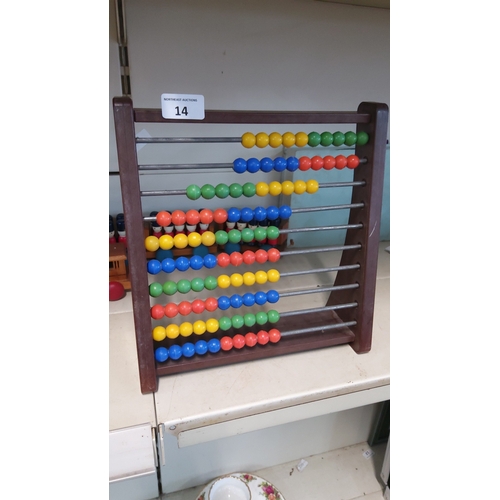 14 - A large wooden-framed abacus, fitted with ten metal rods strung with polychrome spherical counters, ... 