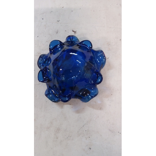 16 - A hand-blown art glass bowl with deeply ruffled rim, in cobalt blue with controlled-bubble inclusion... 