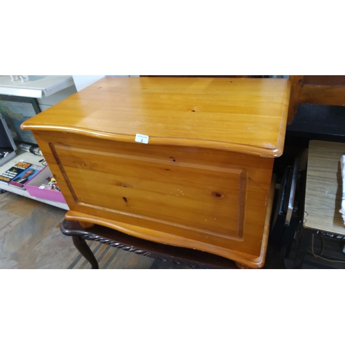 2 - A pine blanket box with hinged lid and plain panelled sides, fitted with internal stay; rectangular ... 