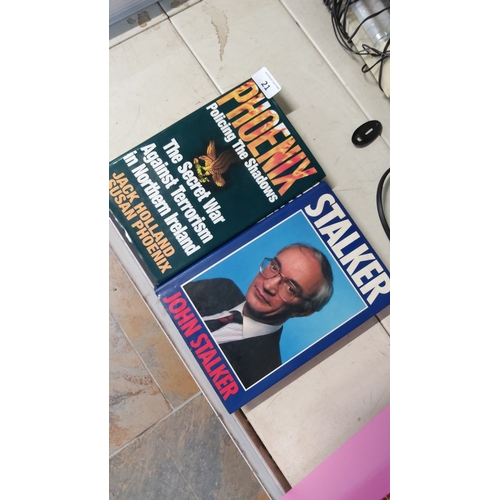 21 - Set of two political hardback books comprising Jack Holland and Susan Phoenix, 