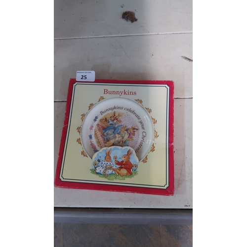 25 - A boxed Royal Doulton Bunnykins child’s plate, decorated with rabbits and the caption “Bunnykins cel... 