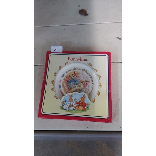 25 - A boxed Royal Doulton Bunnykins child’s plate, decorated with rabbits and the caption “Bunnykins cel... 