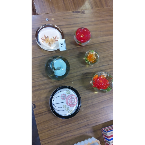 33 - Set of 6 decorative paperweights and shallow dishes.