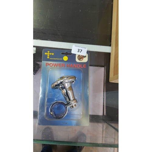 37 - A boxed T Boyz Toys chrome-effect power handle, with clamp fitting, presented in original blister pa... 