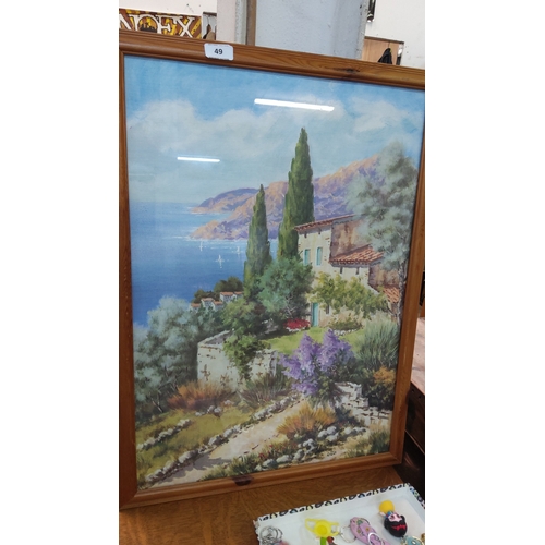 49 - A framed coastal landscape painting, depicting a Mediterranean villa and garden with cypress trees o... 